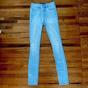 Hollister High-Rise Super Skinny Jeans. A light blue color. W - 23. L - 30